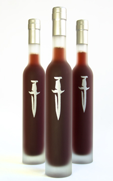 DAGGER is a dry Cherry and Black Currant wine, a delux and more intense cousin to Dat Rosa' with a stronger infusion of Hibiscus, Rose Hips, and Chamomile and Elderberry flowers.   